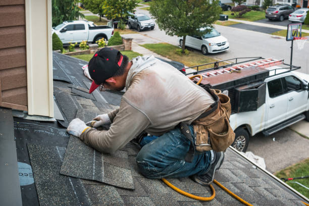Professional Roofing technician working in Council, NC